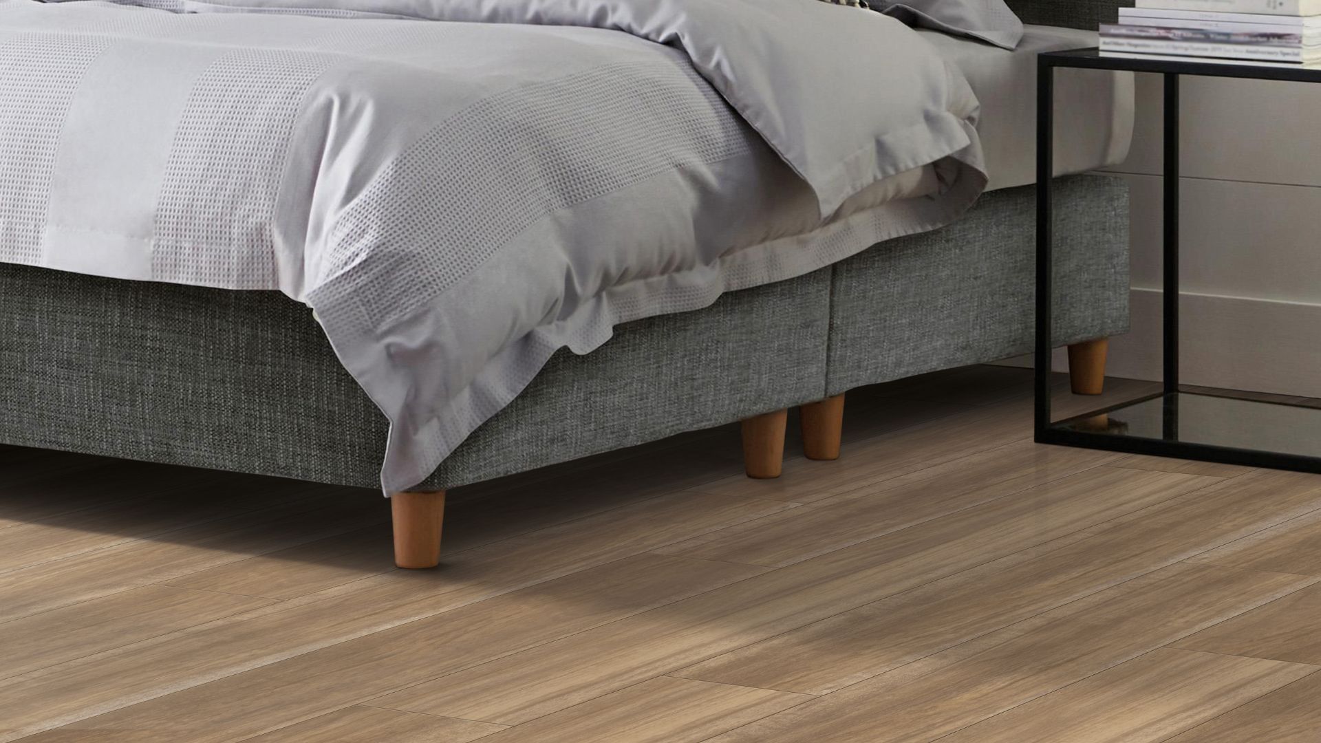 luxury vinyl plank flooring in a cozy bedroom